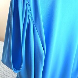 Karl Lagerfeld Light Blue V-Neck Blouse Open Shoulder. 100% Polyester. Medium